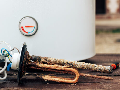 Rust in Hot Water Heater outside in a modern Texas home.