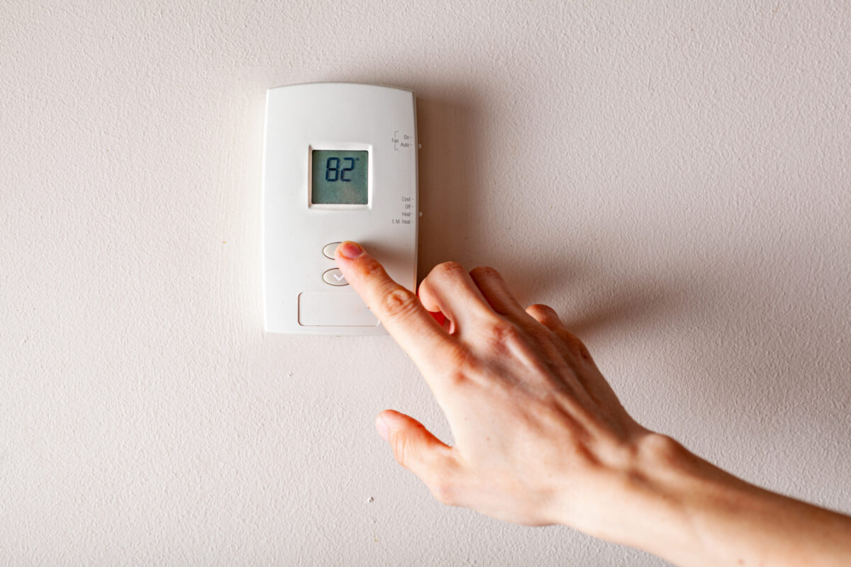 A cozy home scene featuring modern thermostat.