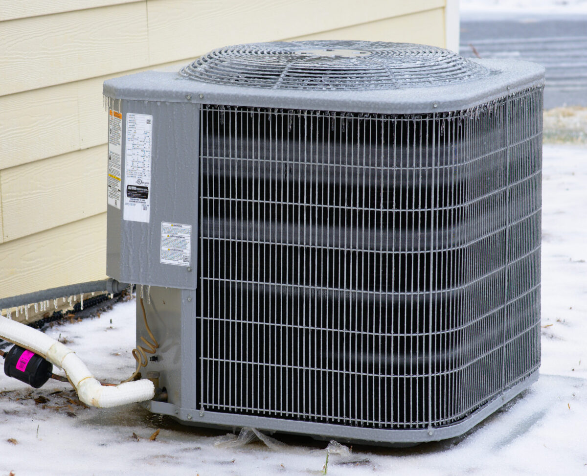 A frozen AC unit outside a Texas suburban home.